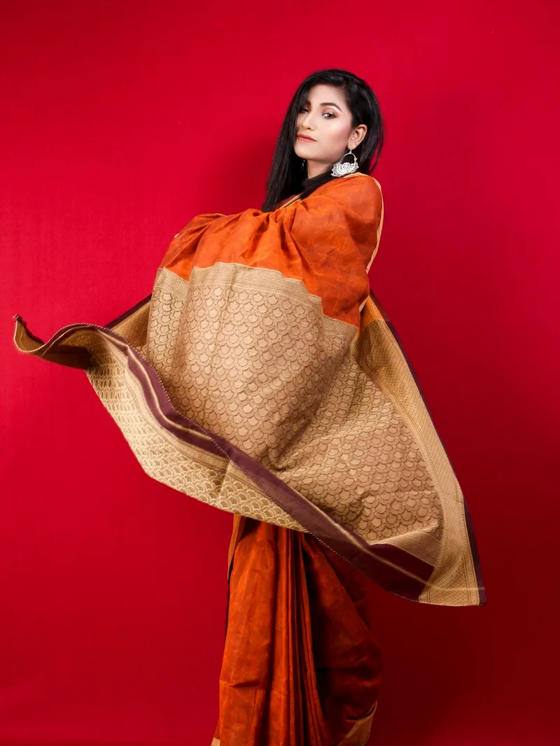 Alpha Rust Orange Semi Silk Saree